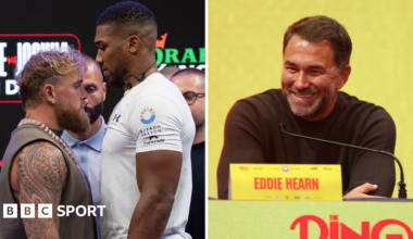 Francis Ngannou falls as he is punched by Anthony Joshua