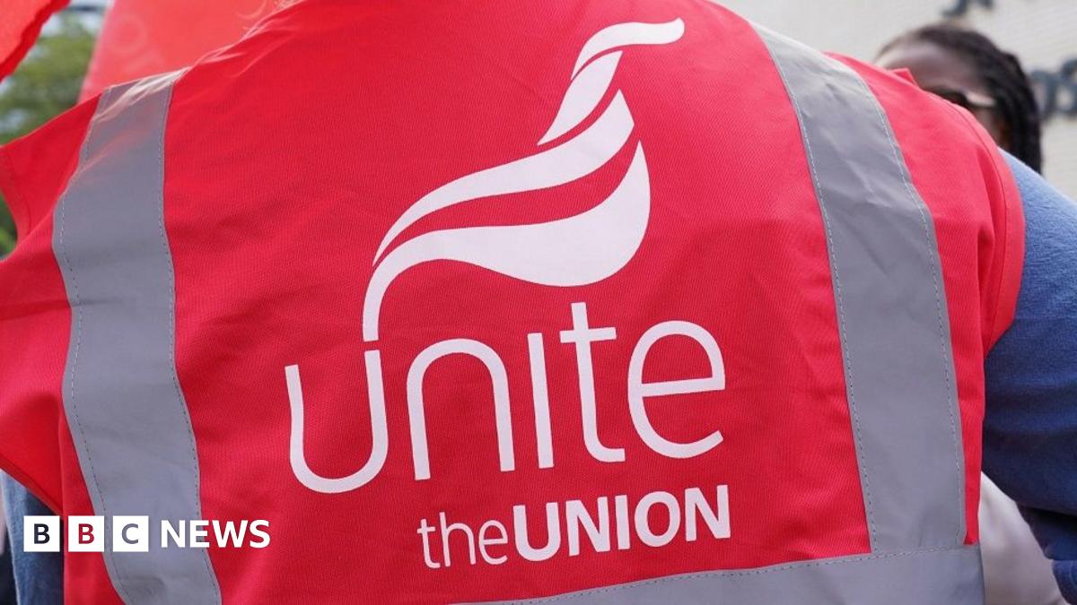 Man wearing Unite the Union red tabard
