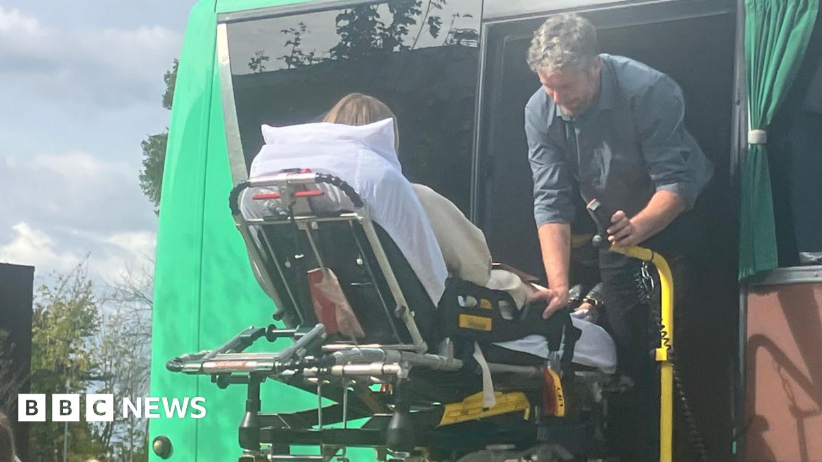 A special lift being used the side of the so called Jumbulance a converted coach that help transport people with disabilities and illnesses