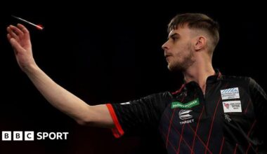 Dom Taylor throws a dart