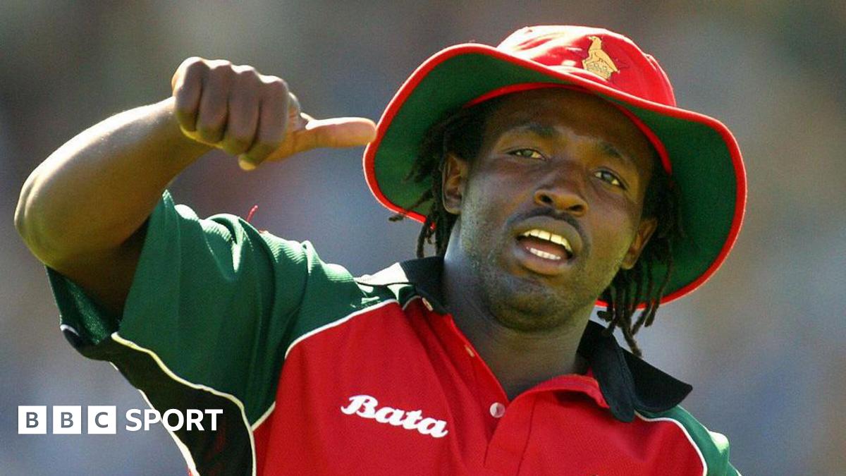 Douglas Hondo gives the thumbs in his red Zimbabwe kit during a one-day international