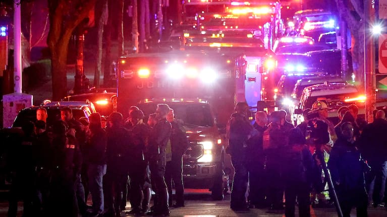 Emergency personnel gather on Waterman Street at Brown University in Providence, Rhode Island. 