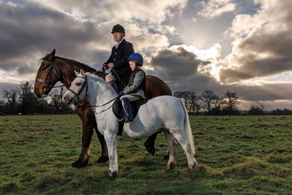 Pat Dillon with his daughter Harriet (6) at the St Stephen's Day Hunt in Kells, Co Meath, which is organised by the Meath Hunt. Photo: Mark Condren.