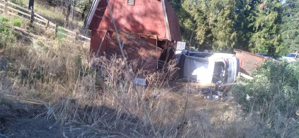 Out of control vehicles flying off the Highway 97 embankment often crash into Burton's barn, shed, or boat,  causing thousands of dollars in damage and insurance claims. 
