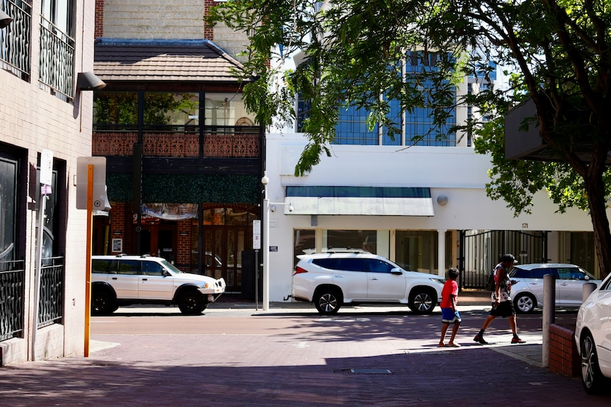 Cars parked in front of venues.