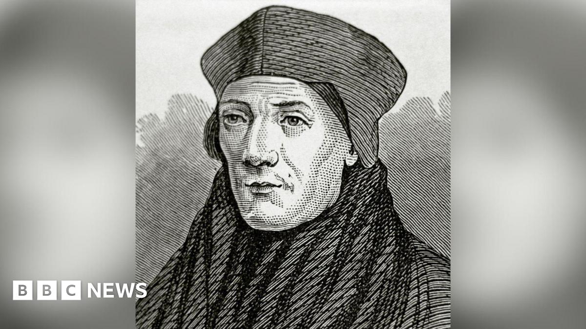 A black and white drawing of the Bishop of Rochester, John Fisher, from the Tudor era. He is wearing robes that reach up to cover his neck and a bishop's mitre (hat), which is low with peaks in the middle and at the sides.