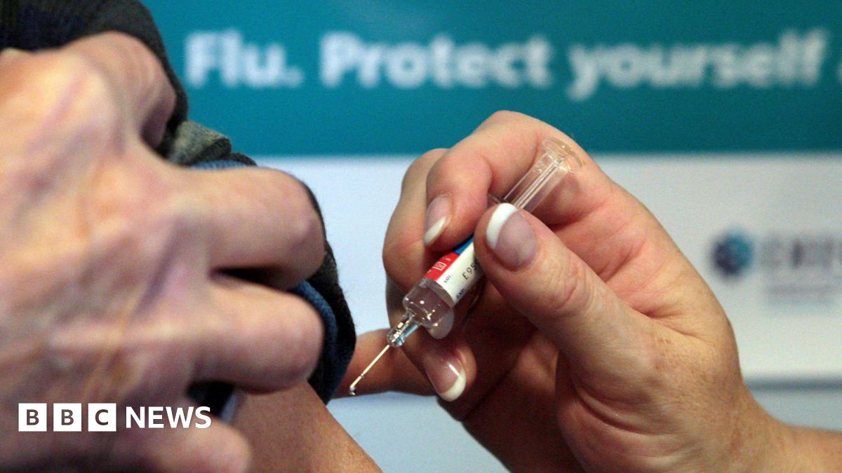 File photo dated 05/10/09 of a patient receiving the seasonal flu vaccine.