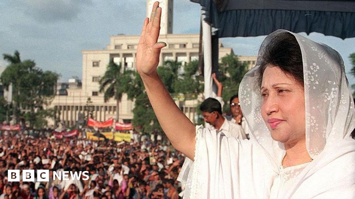 Khaleda Zia waves at her supporters 22 June before addressing a protest rally at Dhaka's downtown Paltan Maidan ground.