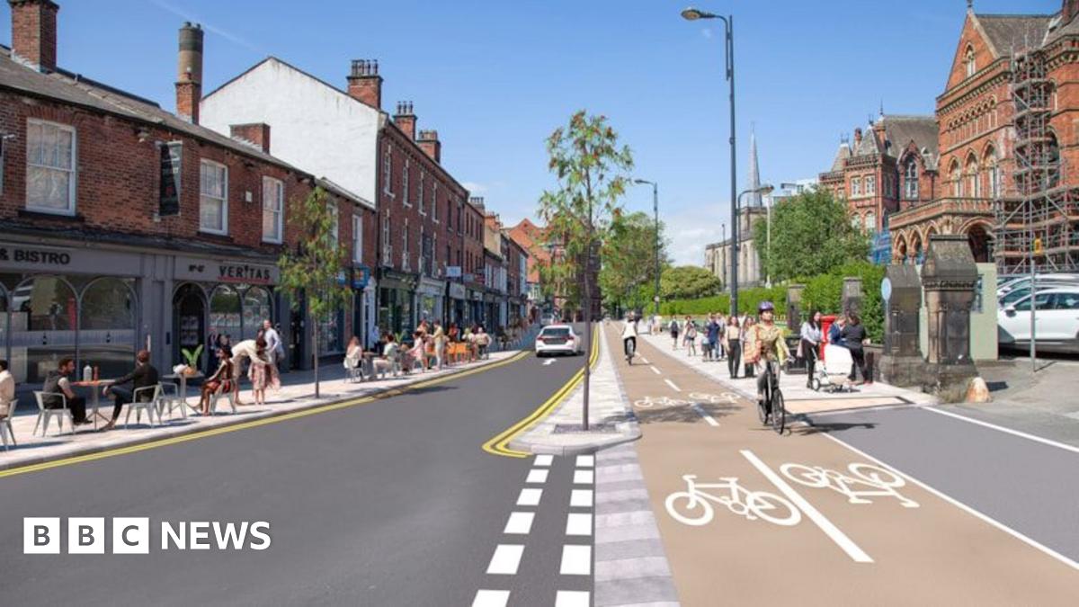 A rendering of a busy city centre with a cyclist and pedestrians eating at outdoor cafes.