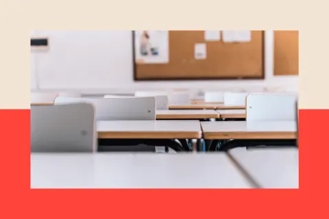Getty Images Tables and chairs in a school classroom