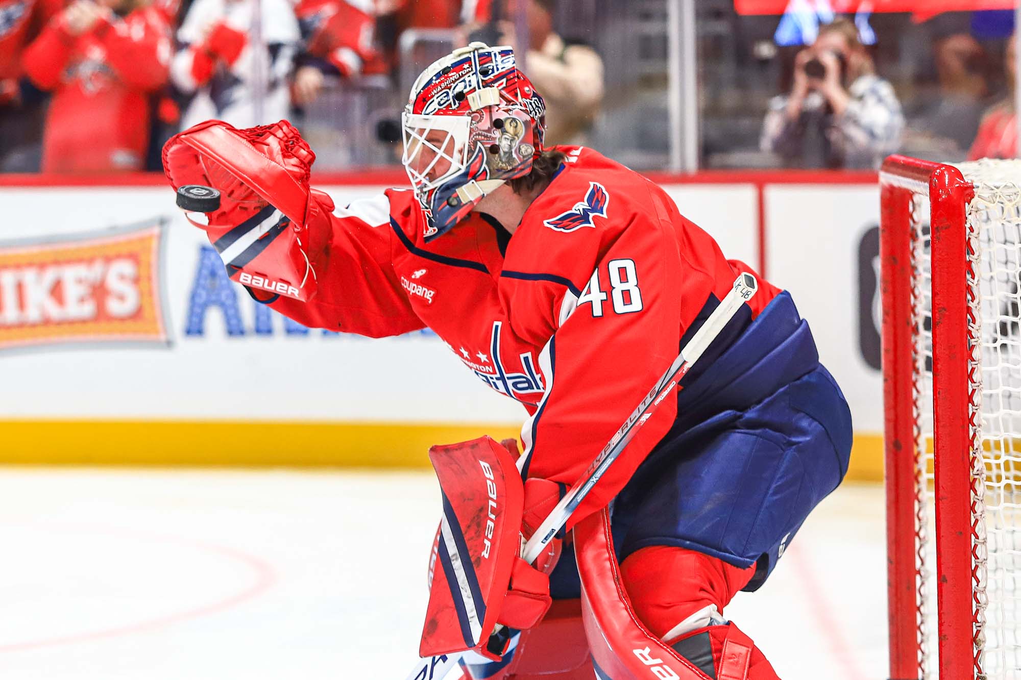 Logan Thompson catches a puck during warmups