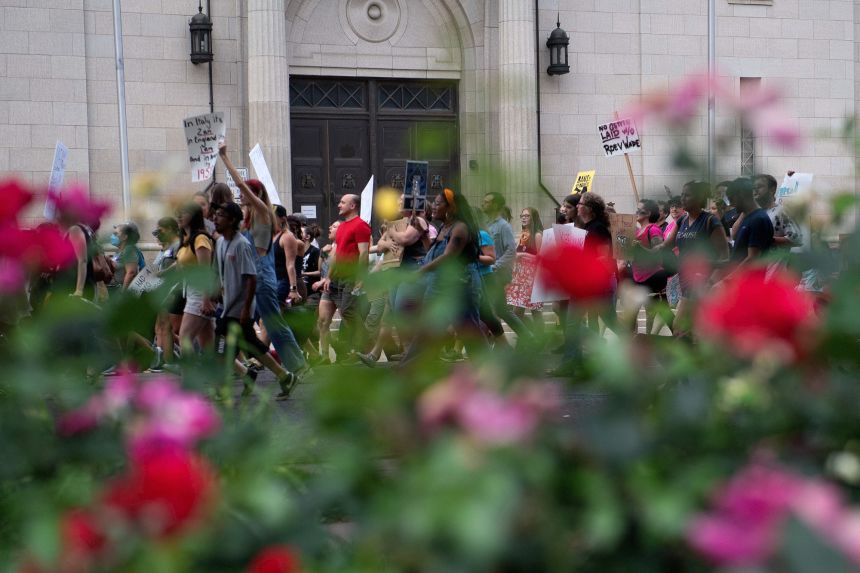 Abortion rights activists marched in Denver, Colorado on June 27, 2022, four days after the US Supreme Court struck down the right to abortion.