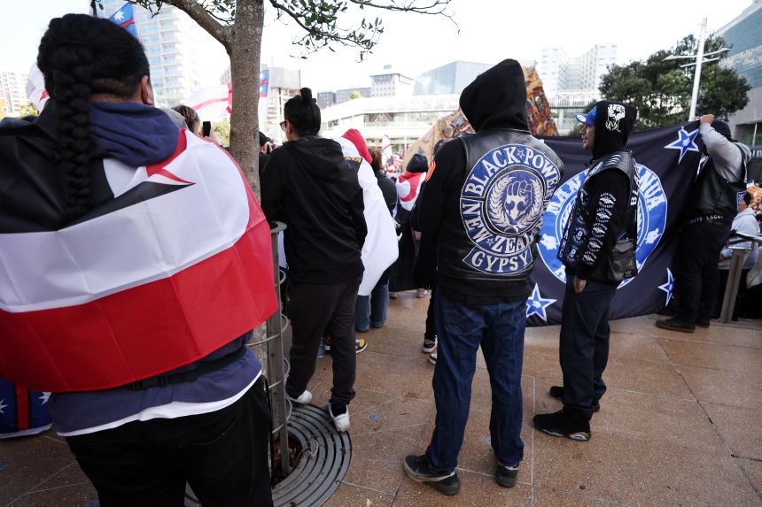 Black Power gang members wearing insignia join a march down Queen St in Auckland, New Zealand on May 30, 2024.
