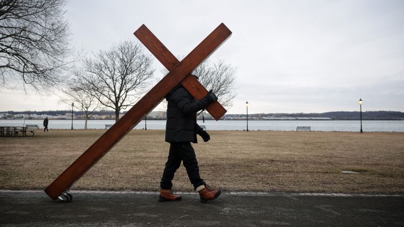 When communities are grieving, Dan Beazley arrives bearing a 10-foot cross. Here’s his story