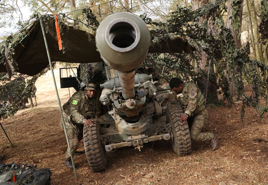 Soldiers of the 88th Gun Battery of the British Army prepare an artillery gun during the Allied Spirit 25 military exercise in Germany.