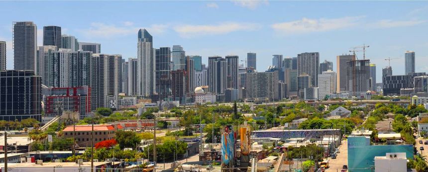 The Miami skyline rises above the Wynwood neighborhood on Tuesday, June 4, 2024.
