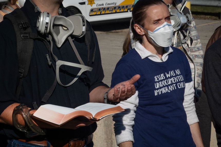 Community members attend a religious service outside of the immigration processing and detention facility in Broadview, Illinois on October 12, 2025.