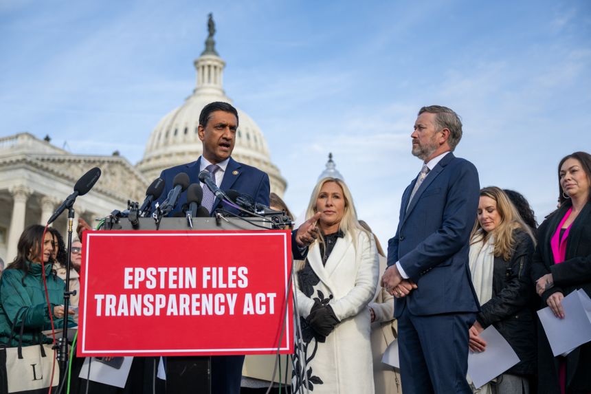 Rep. Ro Khanna (D-CA) speaks alongside Rep. Marjorie Taylor Greene (R-GA) (C) and Rep. Thomas Massie (R-KY) (R) during a news conference on the Epstein Files Transparency Act at the US Capitol in Washington, DC, on November 18, 2025.