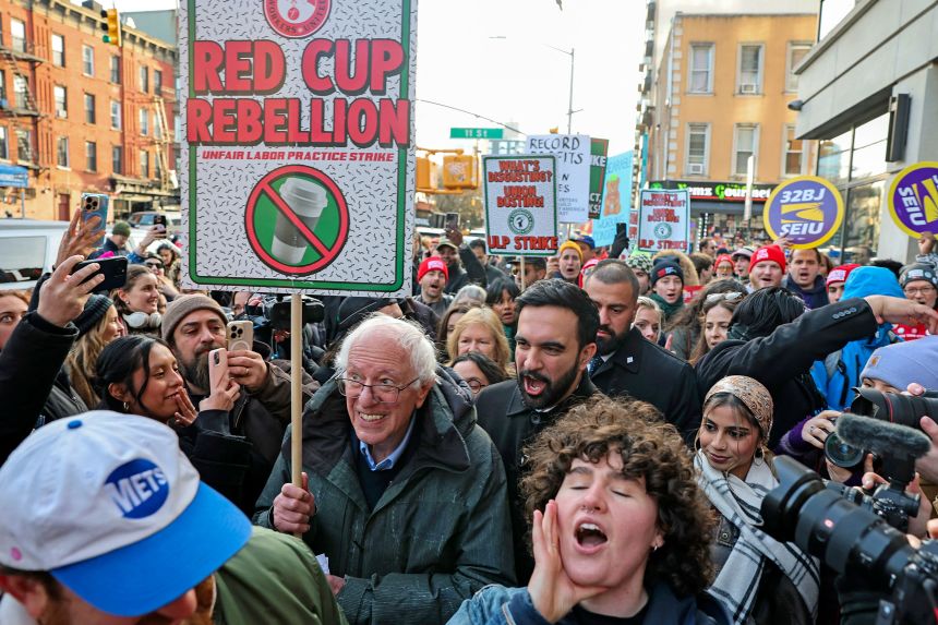 New York City Mayor-elect Zohran Mamdani and US Sen. Bernie Sanders join striking Starbucks workers in New York on Monday, December 1.