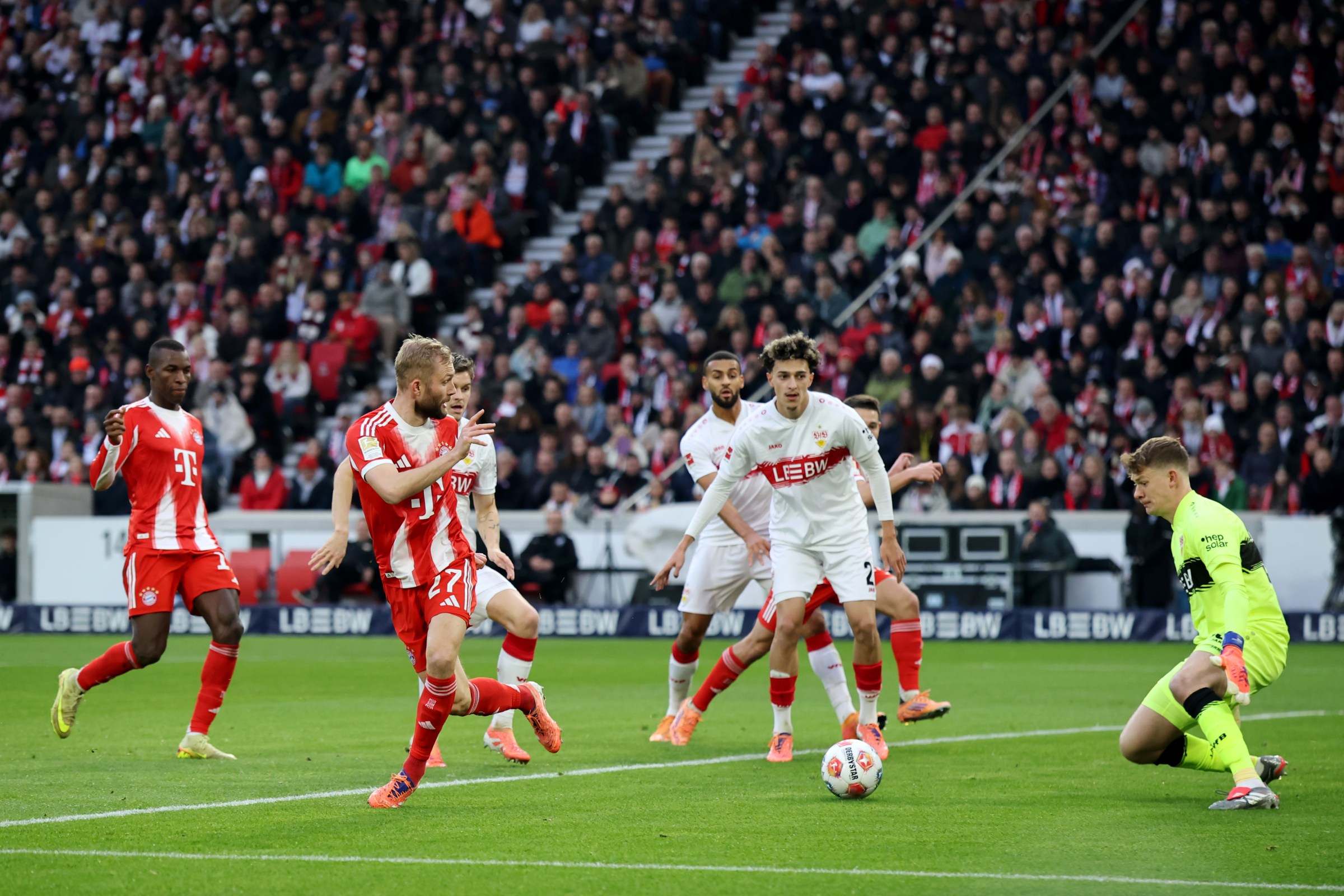 Konrad Laimer scores his team’s first goal past Alexander Nuebel with a cheeky touch. (Photo by Alex Grimm/Getty Images)