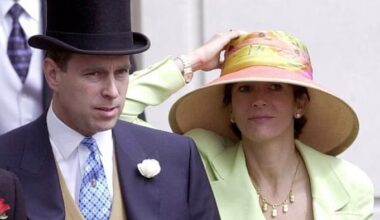 Prince Andrew, Duke of York, in formal attire with a top hat, stands beside Ghislaine Maxwell, who wears a large colorful hat and light green jacket.