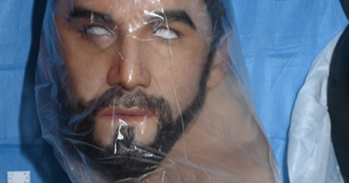 Man charged with 60 offences after police discover multiple weapons, including grenades and loaded guns, in container in Revesby