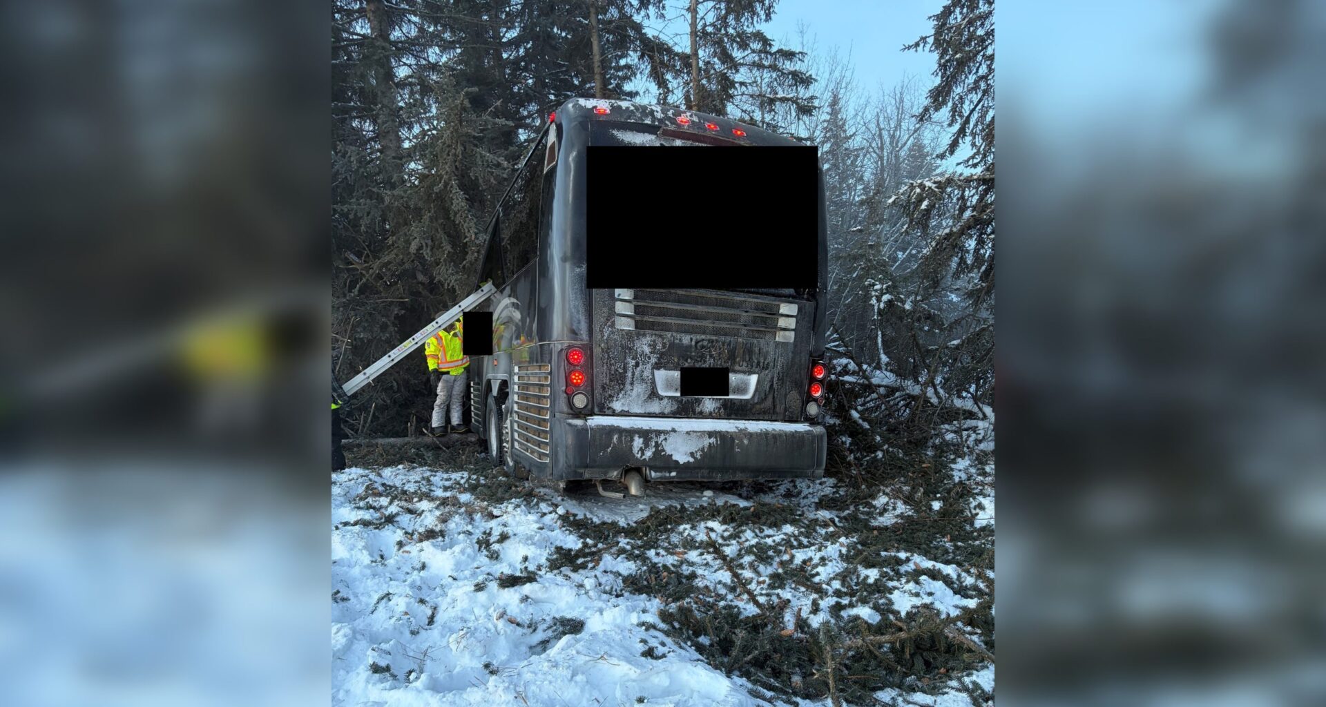 Multiple injuries reported as bus carrying minor hockey team crashes on QEII north of Edmonton