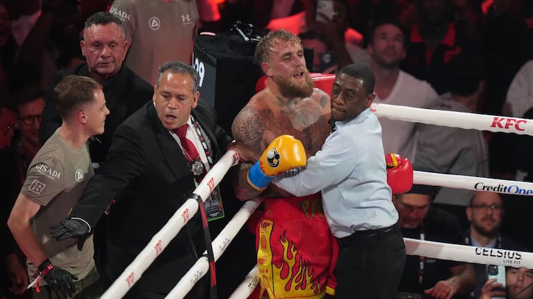 Jake Paul reacts in the corner of the ring during the heavyweight boxing match against Anthony Joshua