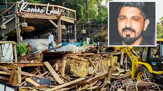 An excavator demolishes wooden structures at Romeo Lane on Anjuna beach after a fire at the adjacent Birch by Romeo Lane nightclub killed 25 people, in Goa on Tuesday, December 9. Chain Owners Saurabh Luthra (inset) and his brother Gaurav have fled India. (Photos: PTI, Instagram/@saurabhluthra16)