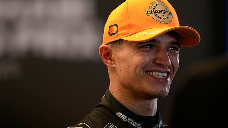 McLaren driver Lando Norris of Britain celebrates after becoming a world champion after the Formula One Abu Dhabi Grand Prix.