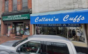 A Check Cashing store on a downtown street