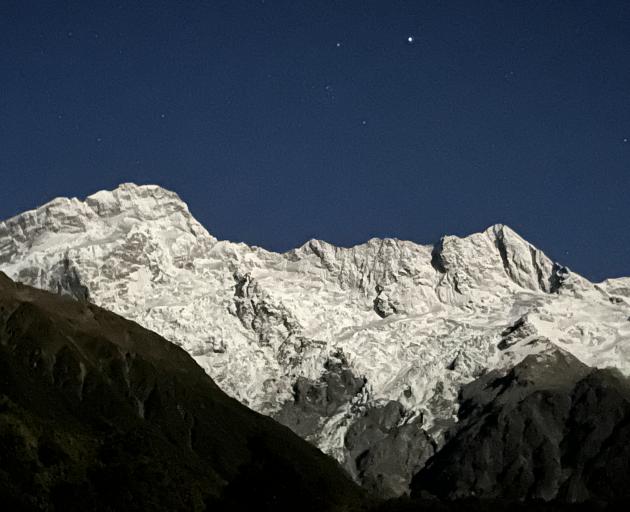 Intense moonlight makes Mt Sefton shimmer long after dark. PHOTOS: PAUL GORMAN