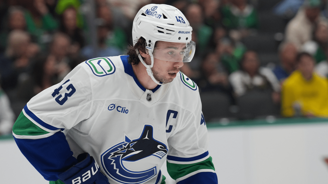 Hughes traded to Wild by Canucks