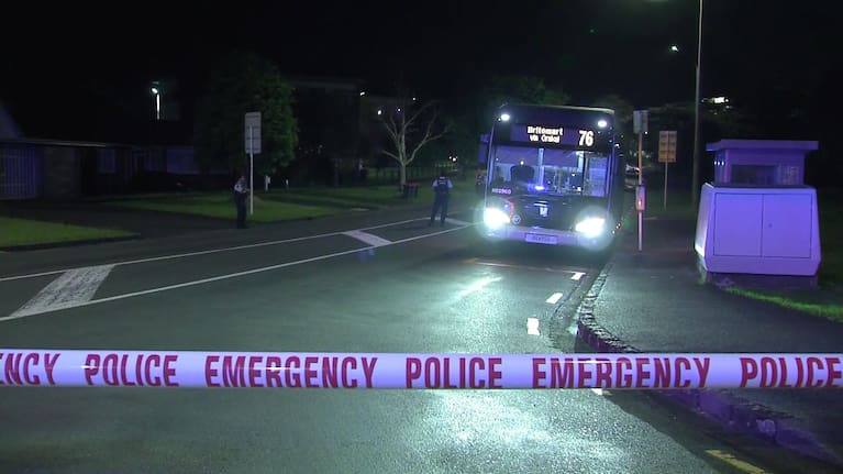 Police cordoned off part of a road where a bus was stopped near Kupe Rd, Orakei. 
