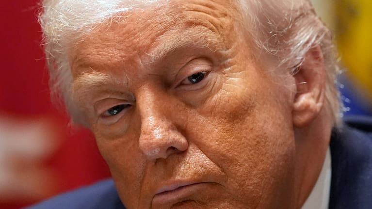 President Donald Trump listens during a roundtable on farm subsidies in the Cabinet Room of the White (file image)