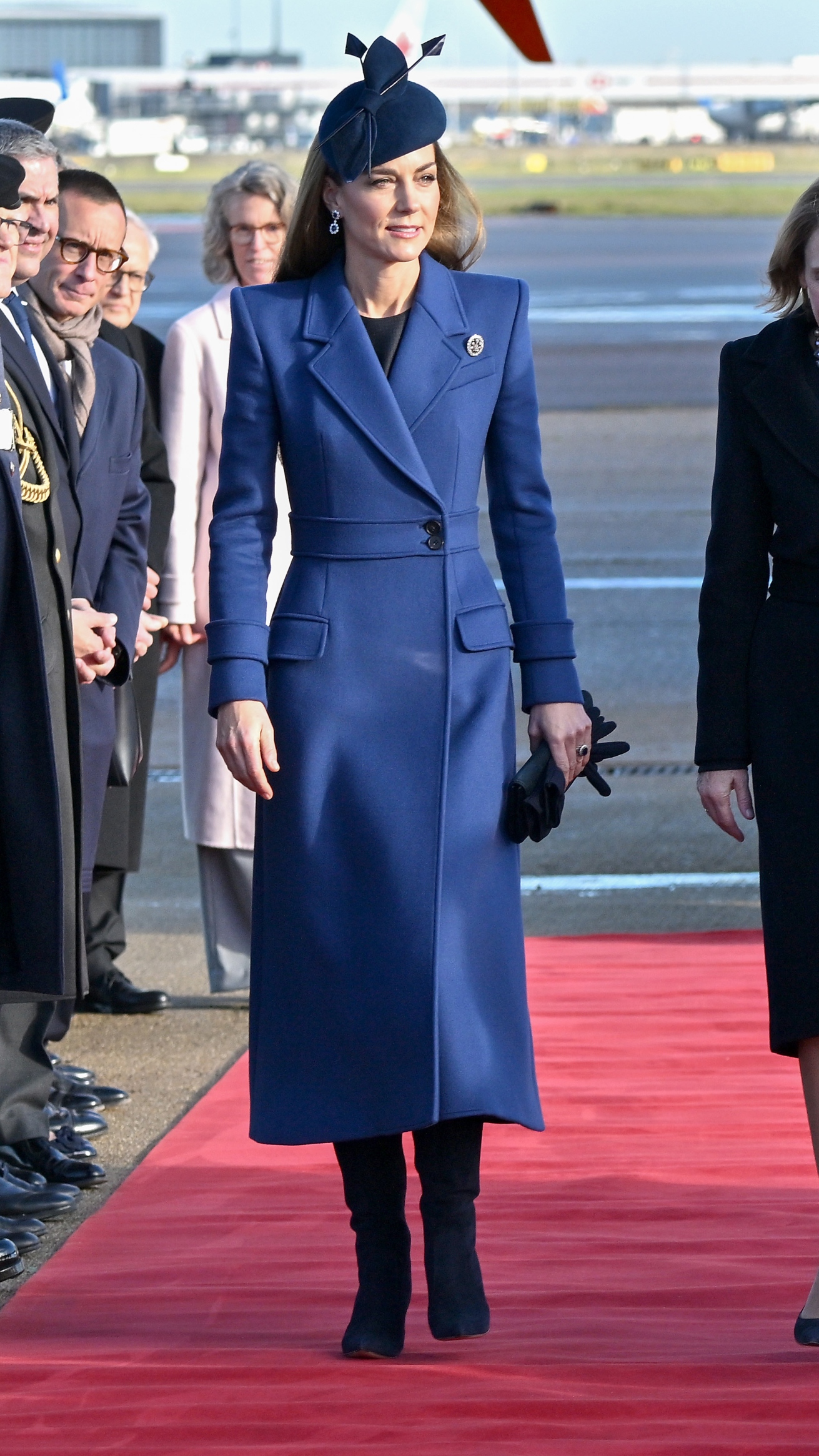 Catherine, Princess of Wales speaks with the President of the Federal Republic of Germany Frank-Walter Steinmeier and his wife Elke B&uuml;denbender (off camera) as they arrive at Heathrow Airport on December 03, 2025