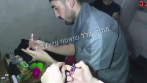 New footage shows six slain hostages marking Hanukkah in Gaza tunnel, singing through