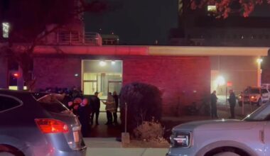 Law enforcement officials gather outside the Brown University campus. Pic: AP