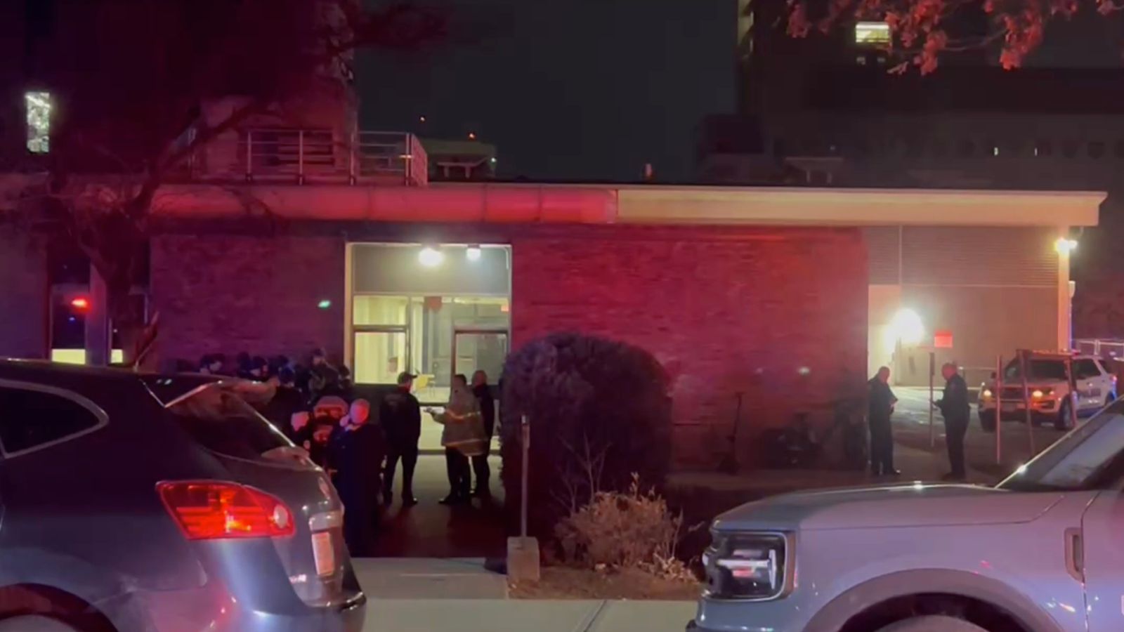 Law enforcement officials gather outside the Brown University campus. Pic: AP