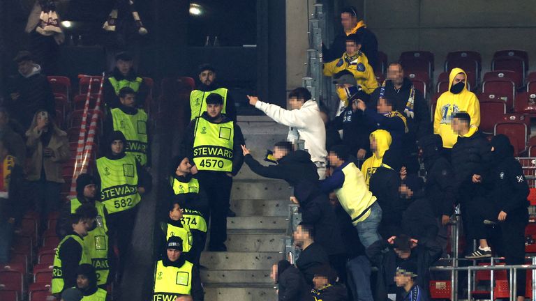 Maccabi Tel Aviv fans react towards VfB Stuttgart fans in the stands after the match. Pic: Reuters