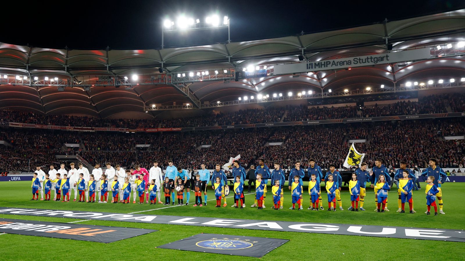 General view of Maccabi Tel Aviv players alongside VfB Stuttgart players before the match. Pic: Reuters