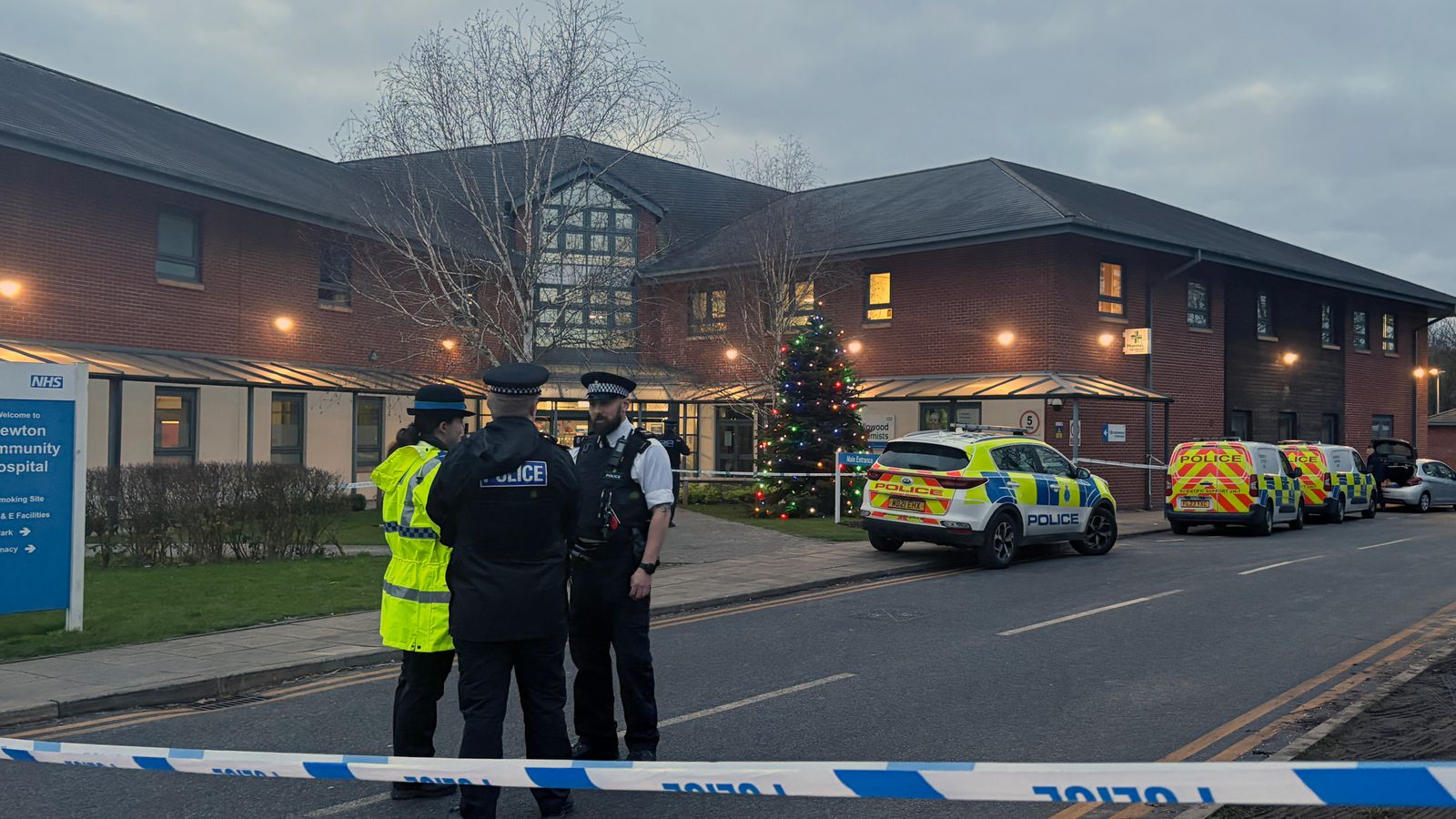 Police outside Newton Community Hospital in Merseyside. Pic: PA