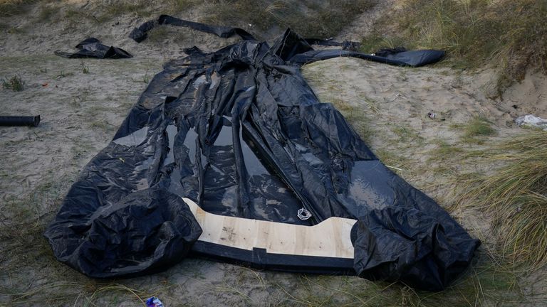 Debris of a small boat used by people thought to be migrants to cross the Channel lays amongst the sand dunes in Gravelines, France. Pic: PA