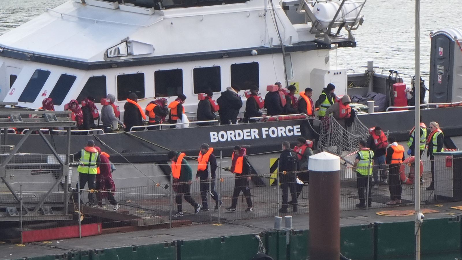 A group of people thought to be migrants are brought into Dover last month. File pic: PA
