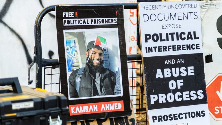 Kamran Ahmed's picture at a protest last month at the Royal Courts Of Justice. Pic: AP