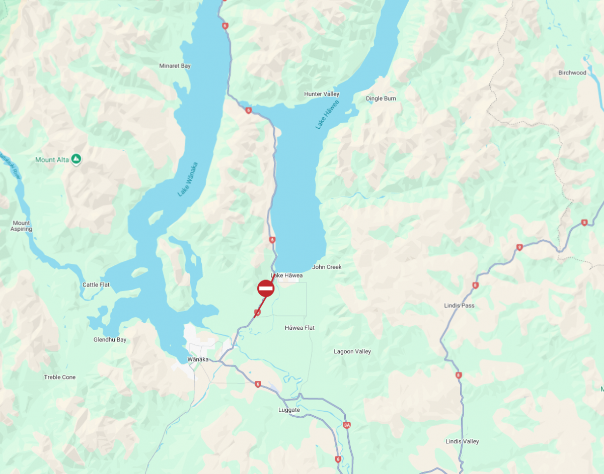 Fallen trees close roads and hit powerlines