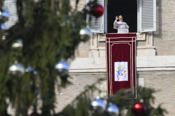 Pope Leo XIV greets pilgrims gathered in St. Peter’s Square at the Vatican for the recitation of the Angelus on Dec. 21, 2025.