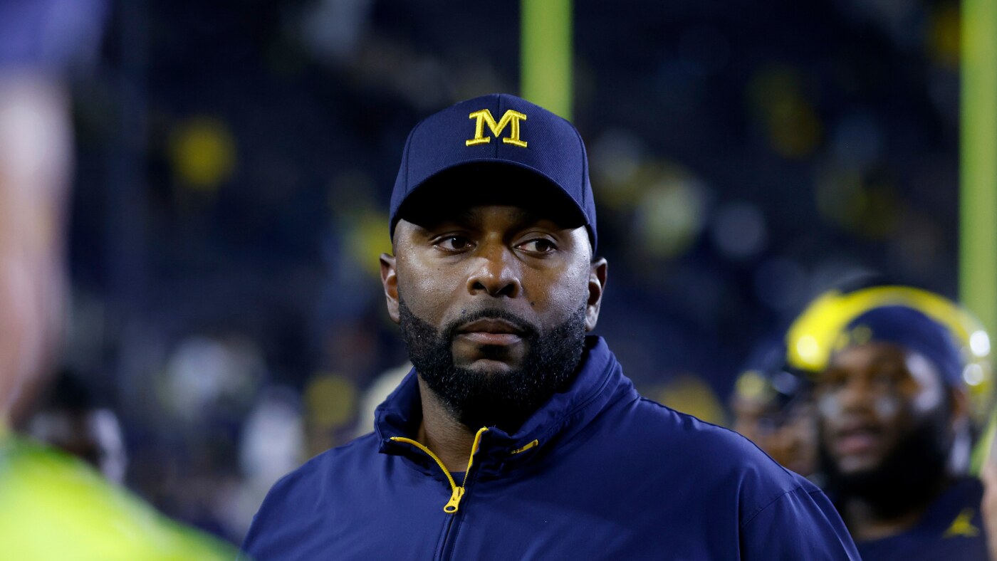 Ex-Michigan football coach Sherrone Moore charged with home invasion : NPR