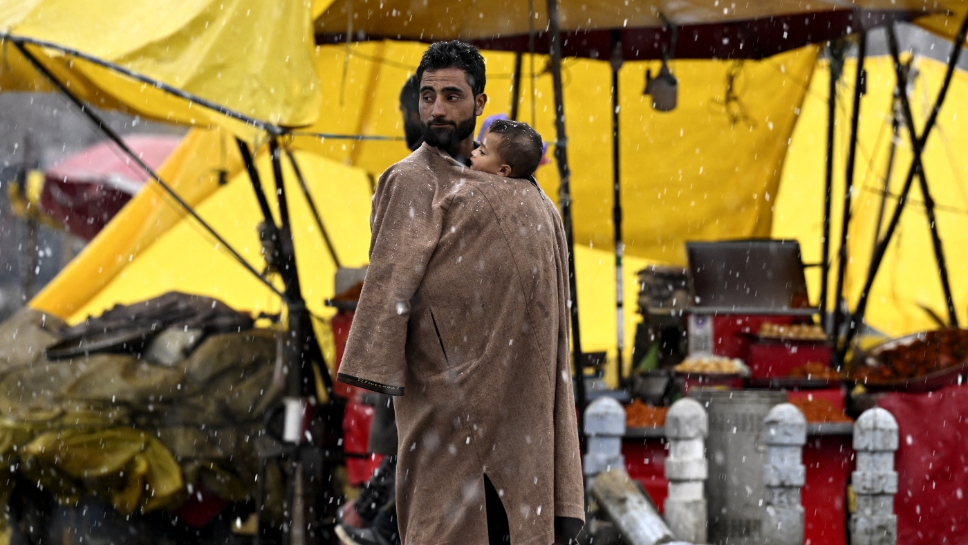 On winter's coldest days, this classic Kashmiri coat offers warmth — and wisdom - NPR