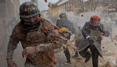 Photos show flour, eggs and firecrackers flying at Spain's Els Enfarinats festival